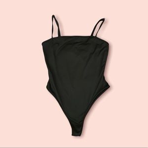 A black bodysuit, fits sizes S and M. Barely worn